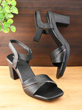 Elegant  heel with textured finish and ankle strap Heel Sandal